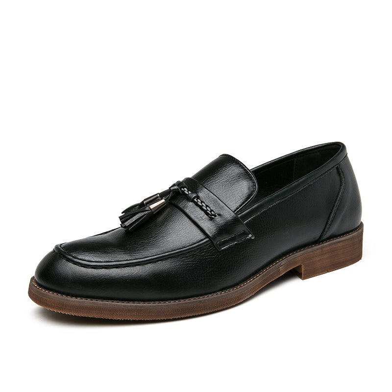 Loafers in Leather with pompons