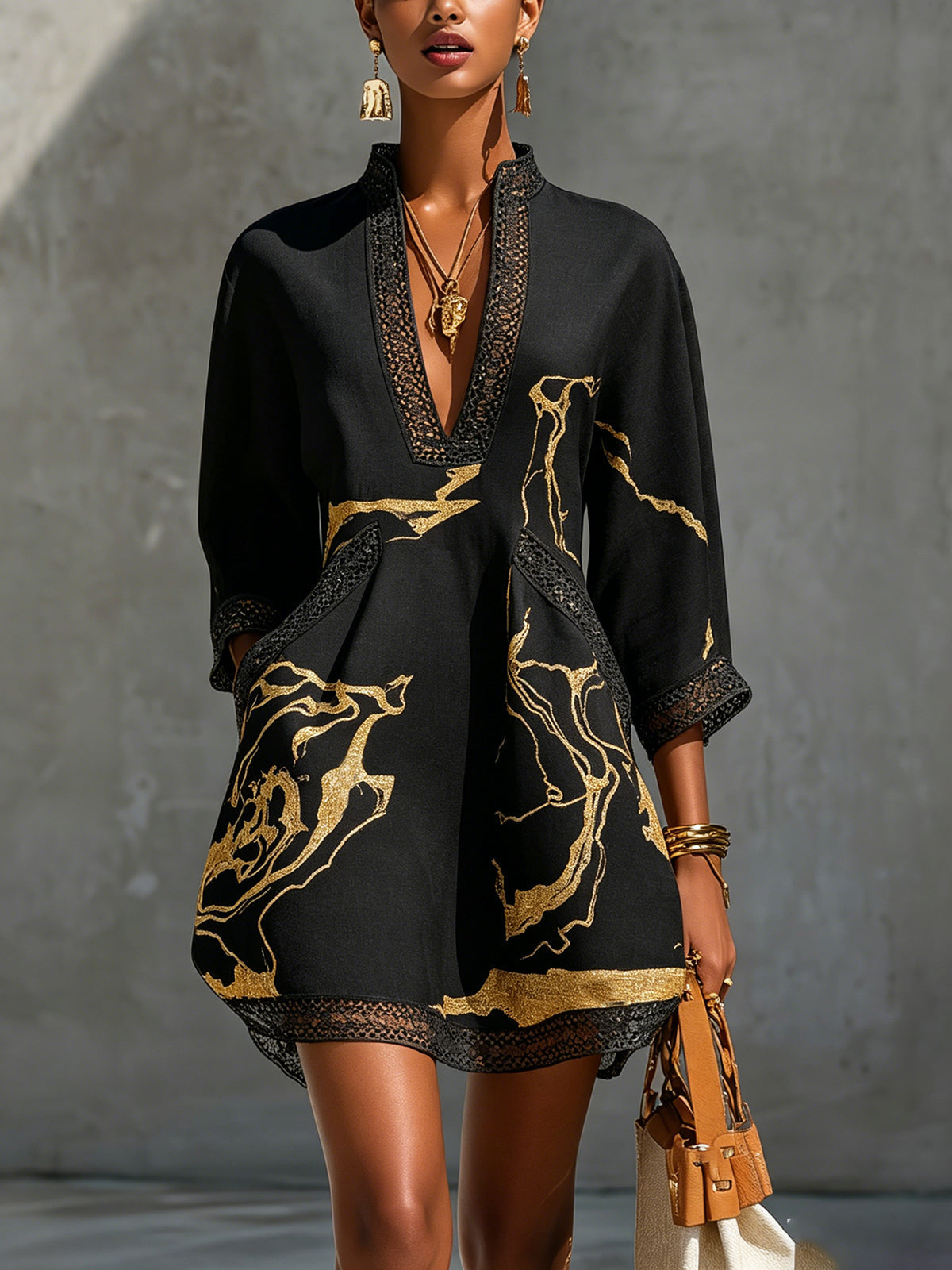 Renata - Short lace dress with golden print and deep V-neck